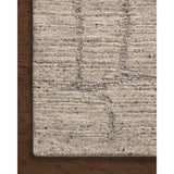 The Raquel Pebble / Granite rug exemplifies what makes a hand-knotted rug so unique. Each area rug has a ribbed texture and subtle striping created by the artisan’s cut-and-loop technique. Raquel features an organic, asymmetrical linear pattern in an airy, neutral palette. Amethyst Home provides interior design, new home construction design consulting, vintage area rugs, and lighting in the Miami metro area.