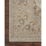 Durable, low pile, and soft, this rug is inspired by classic vintage and antique rugs. The Rosemarie Chris Loves Julia Ivory / Natural ROE-02 rug from Loloi features a beautiful vintage pattern and patina. The rug is easy to clean, never sheds, and perfect for living rooms, dining rooms, hallways, and kitchens!