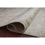 Durable, low pile, and soft, this rug is inspired by classic vintage and antique rugs. The Rosemarie Chris Loves Julia Oatmeal / Lavender ROE-05 rug from Loloi features a beautiful vintage pattern and patina. The rug is easy to clean, never sheds, and perfect for living rooms, dining rooms, hallways, and kitchens!