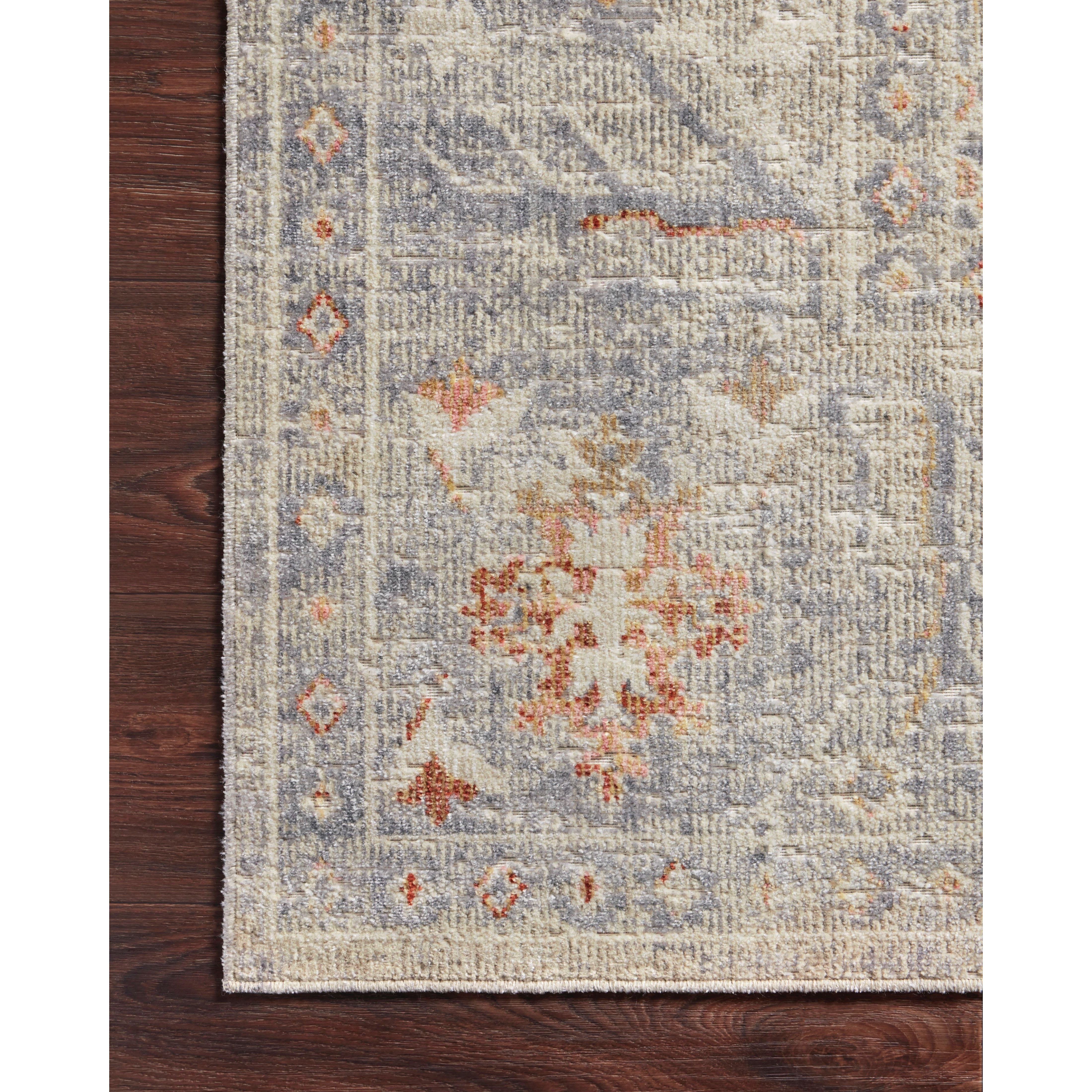 Durable, low pile, and soft, this rug is inspired by classic vintage and antique rugs. The Rosemarie Chris Loves Julia Oatmeal / Lavender ROE-05 rug from Loloi features a beautiful vintage pattern and patina. The rug is easy to clean, never sheds, and perfect for living rooms, dining rooms, hallways, and kitchens!