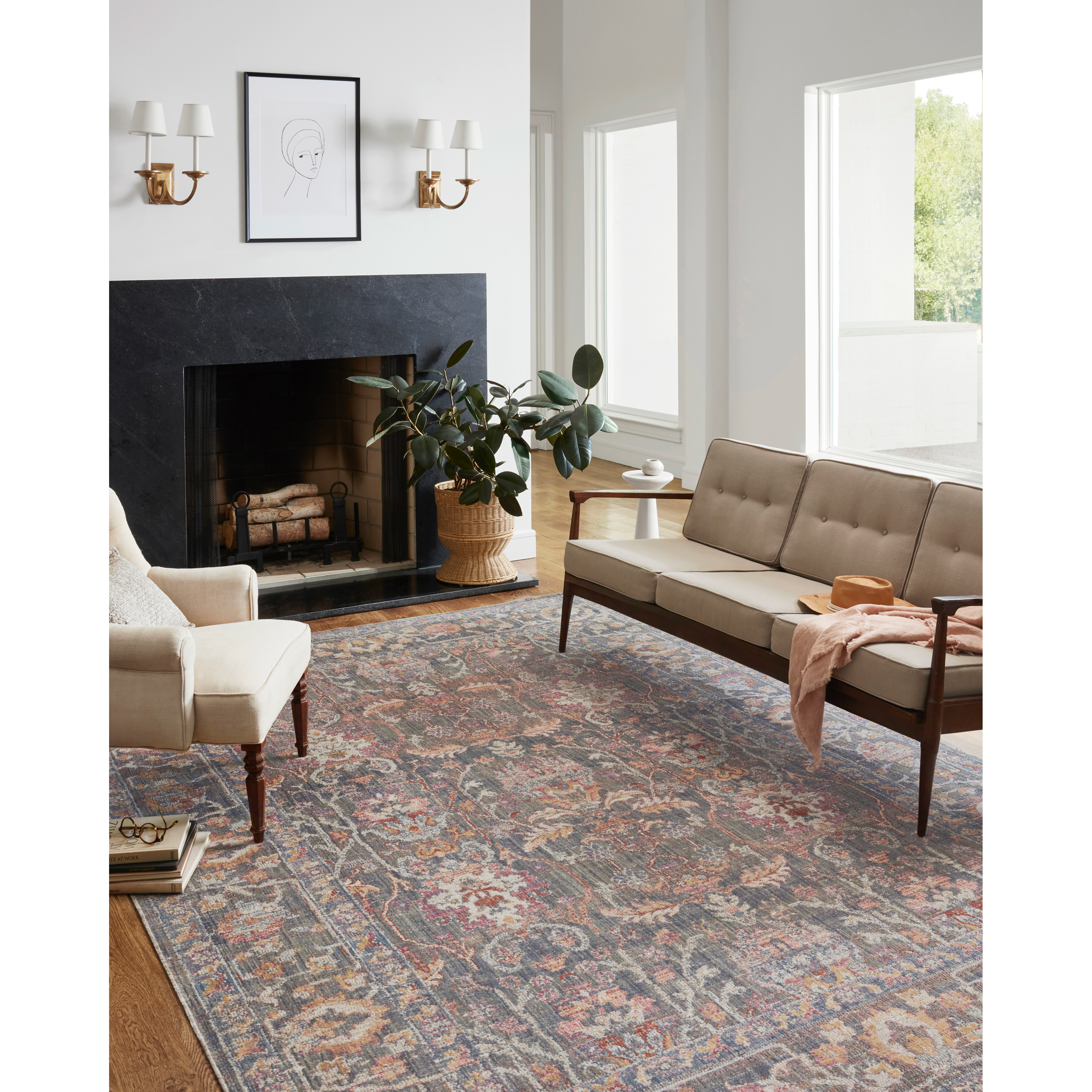 Durable, low pile, and soft underfoot, this rug is inspired by classic vintage and antique rugs. The Rosemarie Chris Loves Julia Stone / Multi ROE-01 rug from Loloi features a beautiful vintage pattern and patina. The rug is easy to clean, never sheds, and perfect for living rooms, dining rooms, hallways, and kitchens!