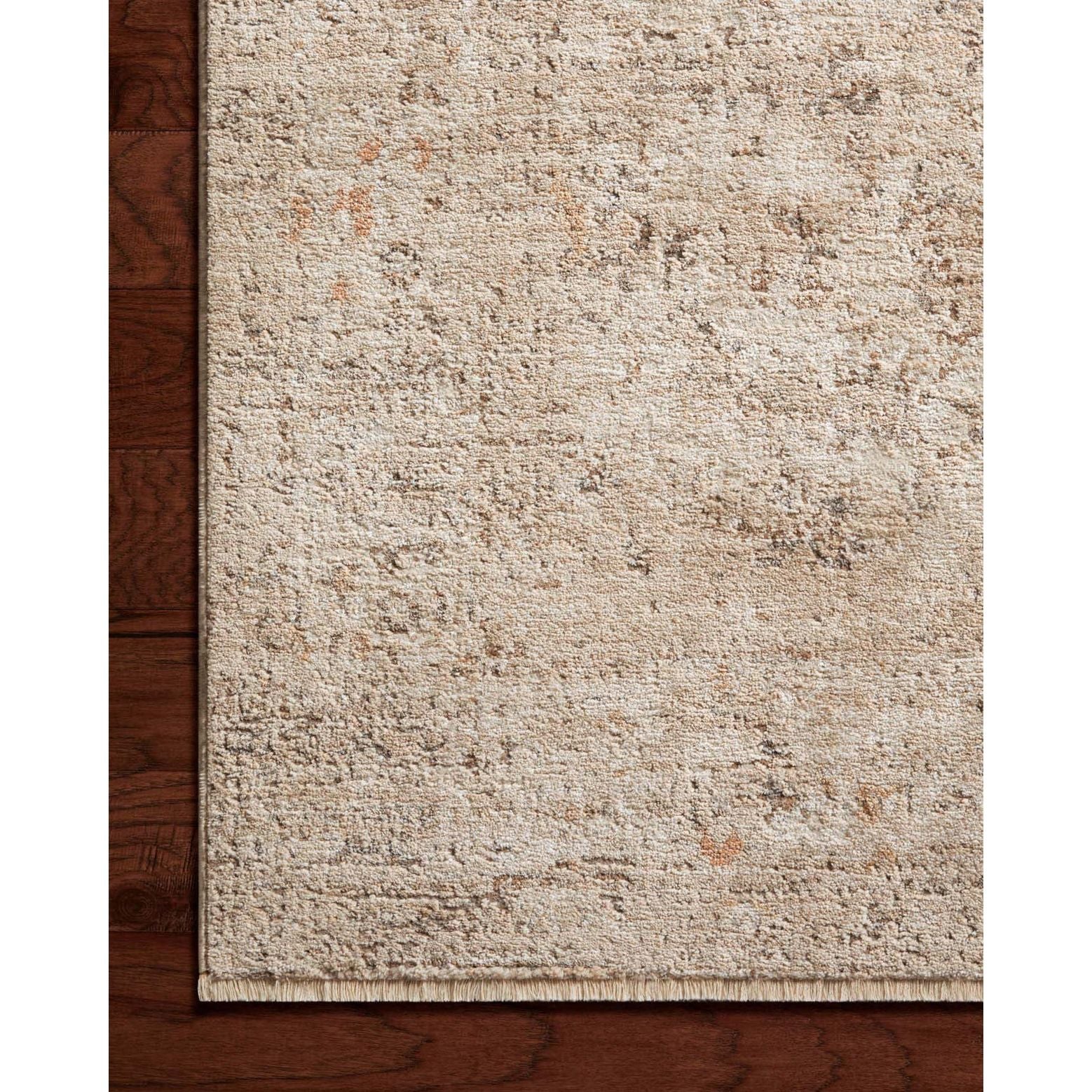 The Sonnet Collection is a versatile area rug with traditional motifs that appear to float and fade from the surface, the result of a new power-loomed construction that combines yarns of different textures. The rug is made of space-dyed polypropylene and polyester for a gradient range of colors that shift with the light. Amethyst Home provides interior design, new home construction design consulting, vintage area rugs, and lighting in the Kansas City metro area.