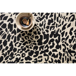 Masai Black/Ivory Rug - Amethyst Home Hooked of 100% wool, this Masai Collection is a softer side of the savannah brought to life by artisans in India. Masai is a beautiful contemporary rug with contrasting hues and is a chic twist on the classic animal print.