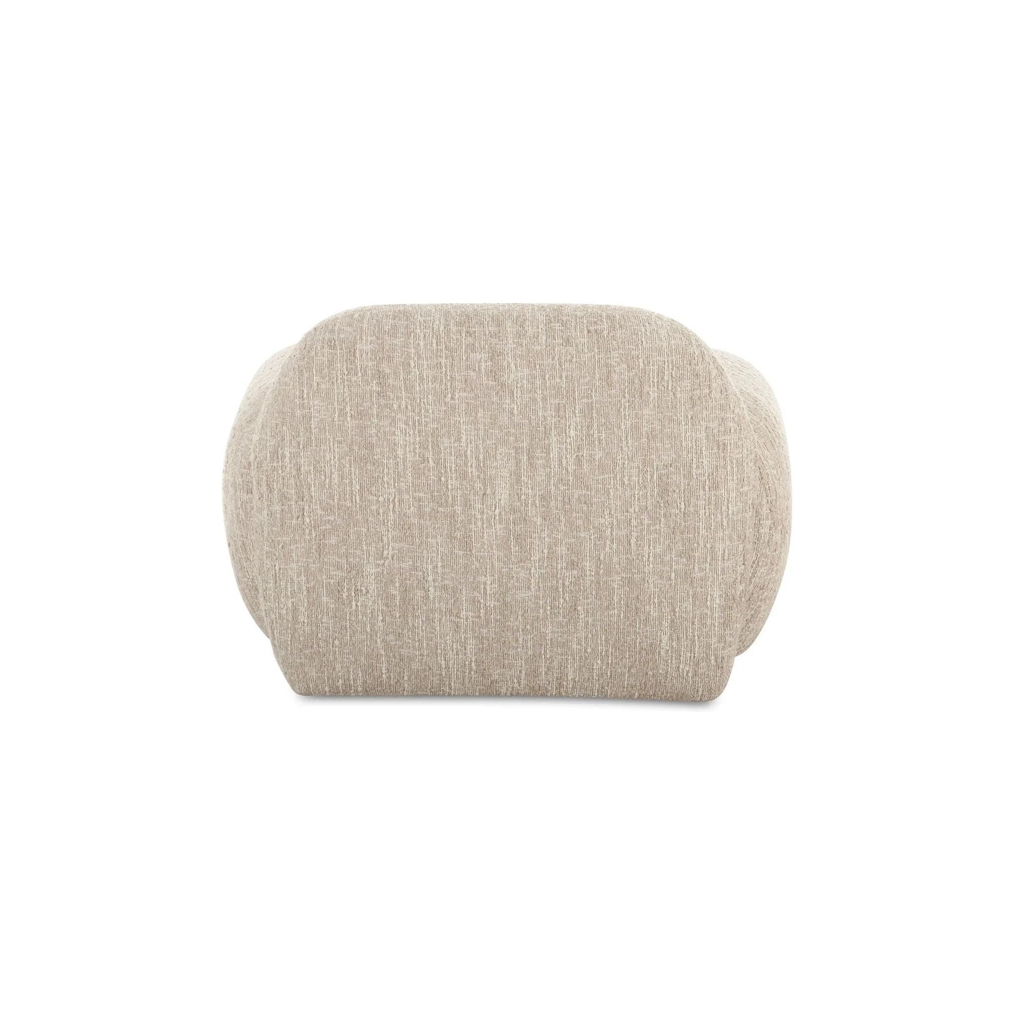 The Hazel lounge chair embraces minimalist, understated elegance with its low-profile, modernist silhouette. Wrapped in exaggerated boucle fabric, it offers a distinct tactility and comfort. The bold, curved arm design makes a stylish statement, harmonizing with the sleek form to create an inviting focal point in any setting Amethyst Home provides interior design, new home construction design consulting, vintage area rugs, and lighting in the Salt Lake City metro area.