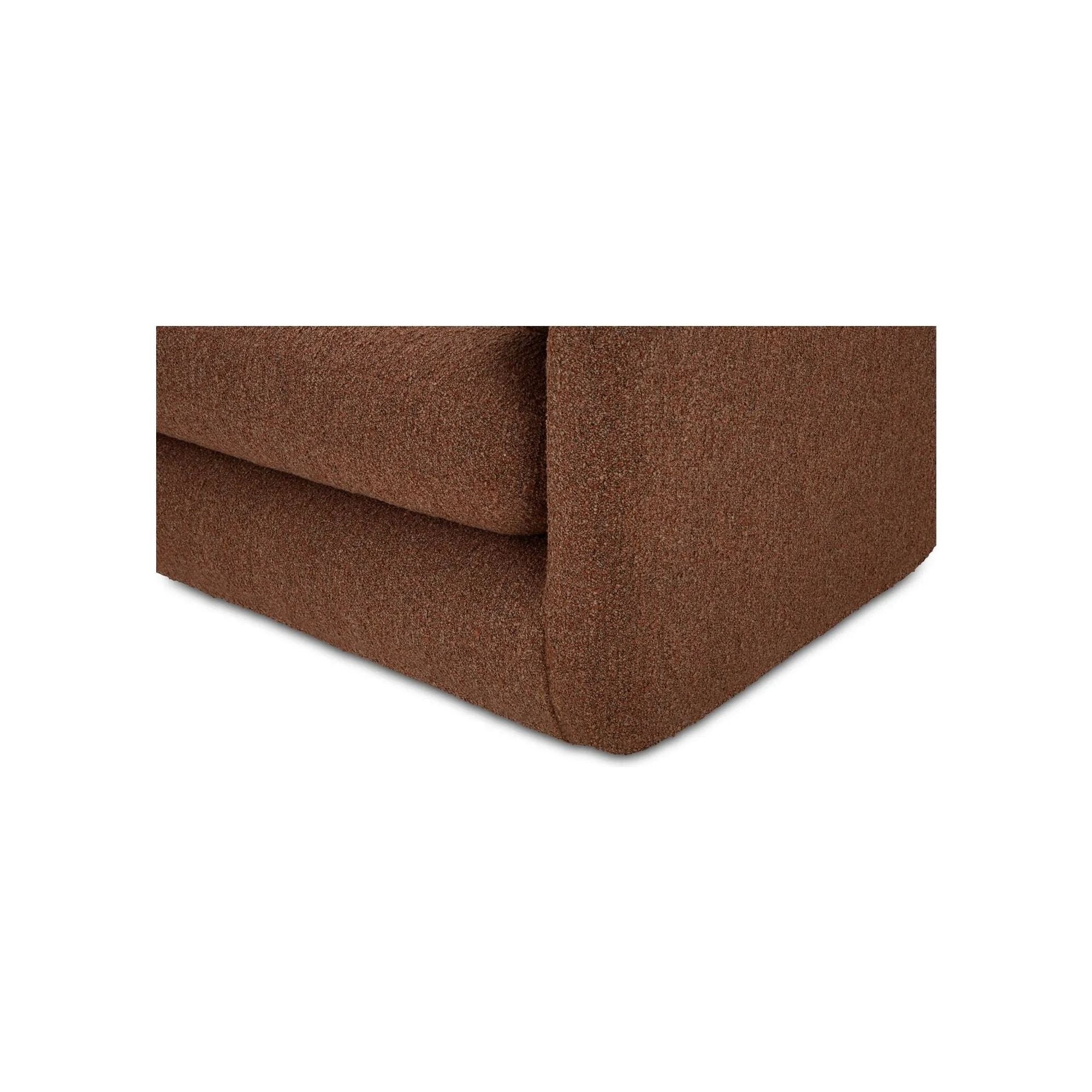 Inspired by the captivating styles of the 70s, the Scout daybed brings a piece of the past into the present. Clad in textured bouclé fabric, the chair merges visual allure and tactility. Its curved form, combined with a rounded and elongated cushion, introduces a touch of softness to any space, while the plump seat cushion promises modern comfort Amethyst Home provides interior design, new home construction design consulting, vintage area rugs, and lighting in the Newport Beach metro area.