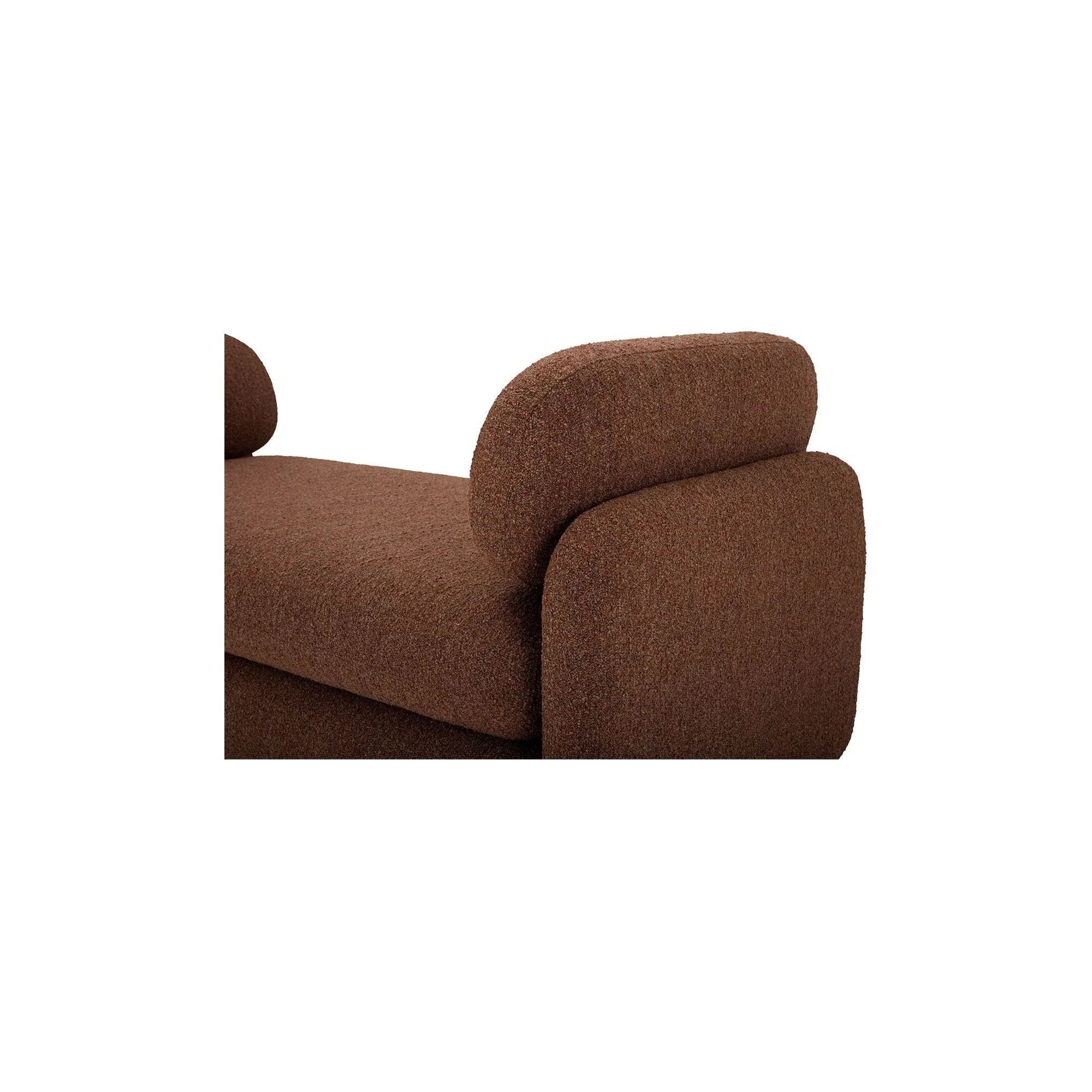 Inspired by the captivating styles of the 70s, the Scout daybed brings a piece of the past into the present. Clad in textured bouclé fabric, the chair merges visual allure and tactility. Its curved form, combined with a rounded and elongated cushion, introduces a touch of softness to any space, while the plump seat cushion promises modern comfort Amethyst Home provides interior design, new home construction design consulting, vintage area rugs, and lighting in the Portland metro area.