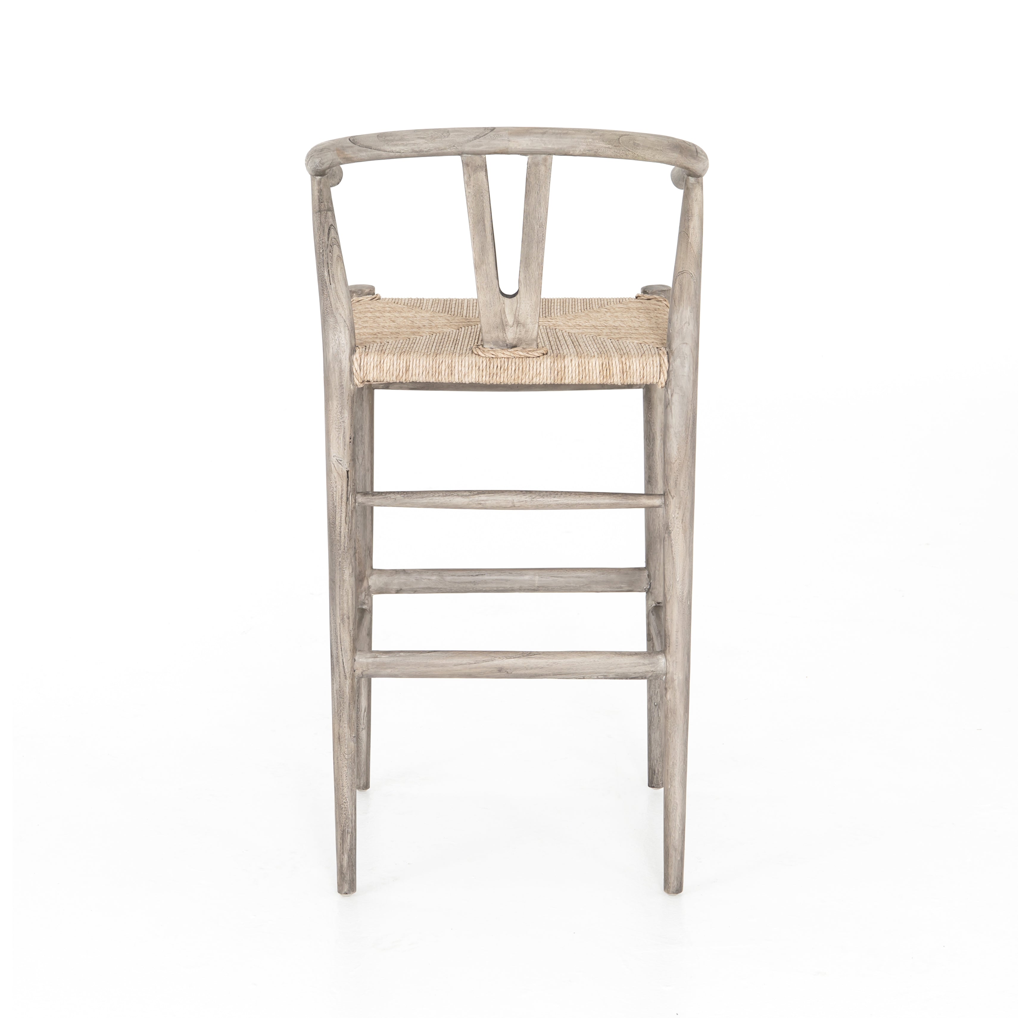 Modern curves redefine the classic wishbone-style counter stool. Vintage white all-weather wicker is woven for a dose of fresh texture within weathered grey teak framing. Cover or store indoors during inclement weather and when not in use. Amethyst Home provides interior design, new home construction design consulting, vintage area rugs, and lighting in the Alpharetta metro area.