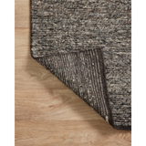 Featuring Mulholland Amber Lewis x Loloi Charcoal / Denim Hand-Knotted Rug by Loloi at Amethyst Home. Taking note of Amber Lewis' signature laid-back California aesthetic, the Mulholland Charcoal / Denim rug is expertly hand-knotted of wool and cotton by skilled artisans in India. The collection offers a soft yet textured pile with a slight variation of tones that make each piece uniq. Amethyst Home provides interior design, new construction, custom furniture, and rugs for the New York metro area.