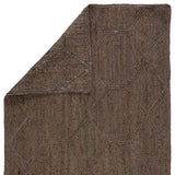 The Naturals Tobago collection delivers rich texture and organic allure to contemporary homes. Handwoven of jute, the Ponce area rug showcases a chic geometric trellis design. The mix of gray, taupe, and brown hues lend a deep natural tone to ground any space.  Handwoven  100% Jute  NAT42 Naturals Tobago Ponce Rug