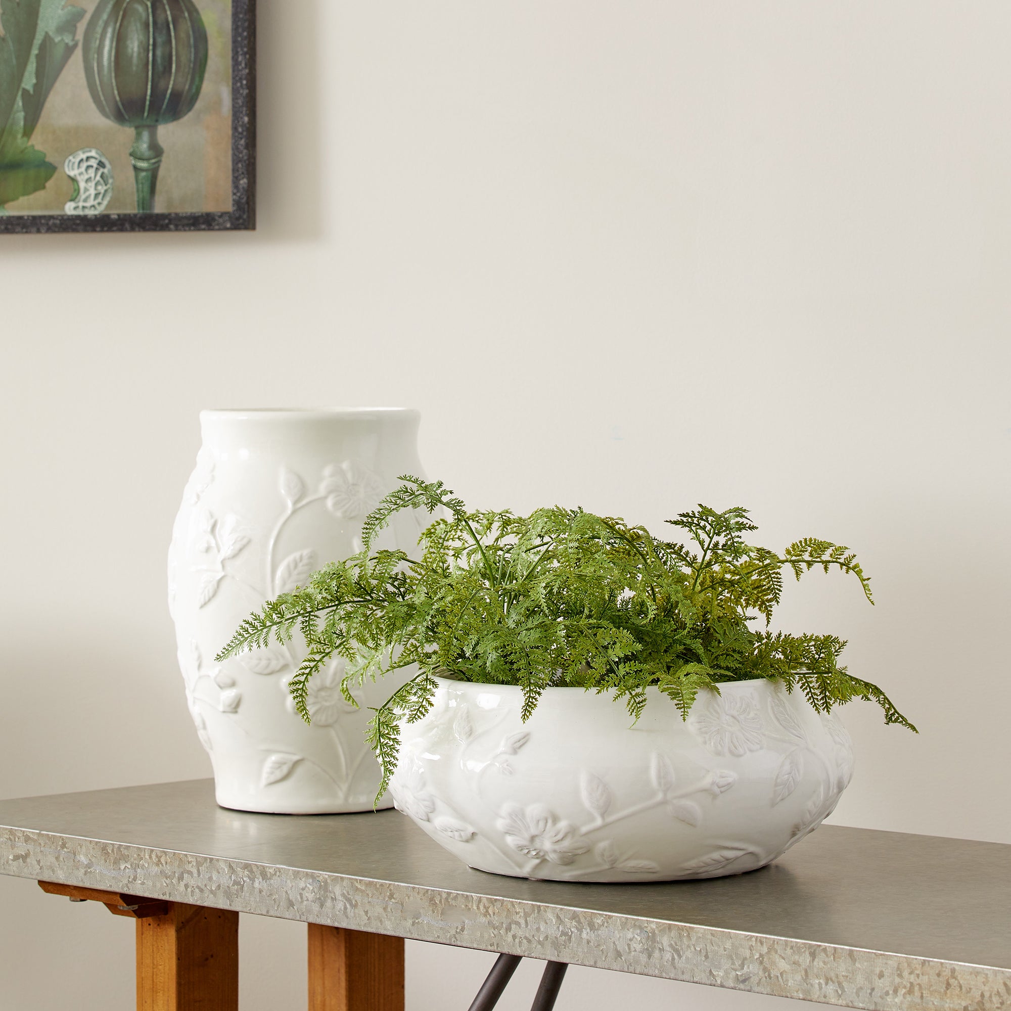 With a low relief floral stem design, this unique Blossom Decorative Bowl is a beautiful addition to the formal space. A glossy bright white glaze and classic shape make it an instant classic. Fill it with your favorite floral drop-in, or just display as is for an elegant look. Amethyst Home provides interior design, new construction, custom furniture, and area rugs in the Portland metro area.