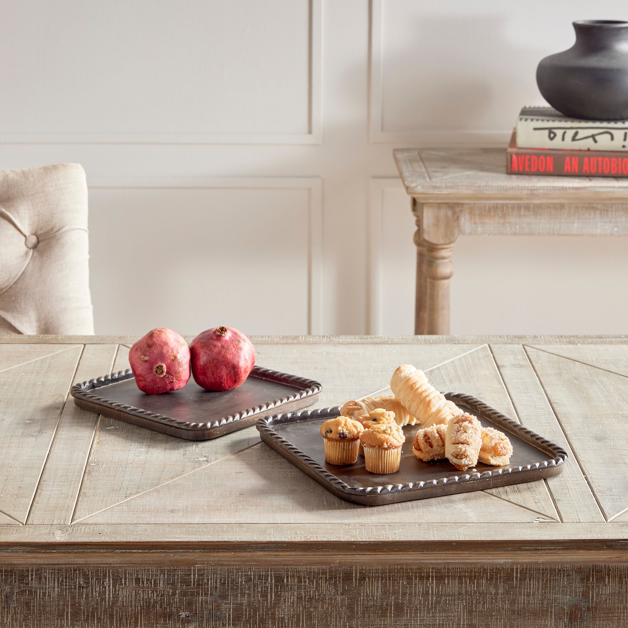 Hand carved from mango wood, this pair of trays is a sweet little accent for baked goods or a cheese tray. A little touch of natural wood tone is always on trend. Amethyst Home provides interior design, new construction, custom furniture, and area rugs in the Boston metro area.