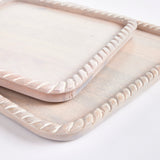 Hand carved from mango wood, this pair of trays is a sweet little accent for baked goods or a cheese tray. A little touch of natural wood tone is always on trend. Amethyst Home provides interior design, new construction, custom furniture, and area rugs in the Monterey metro area.
