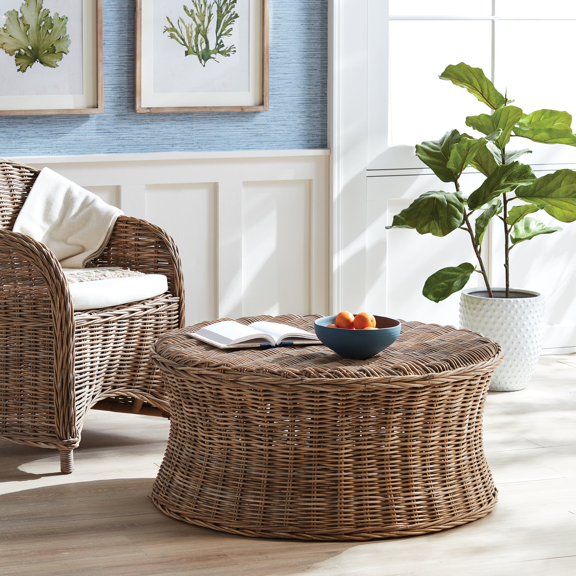 Our search for five-star, hotel-quality rattan led us to develop Normandy. With a finish that is a beautiful blend of gray and brown, something we call "Nature's Gray", this round coffee table is as useful as it is beautiful. Amethyst Home provides interior design, new construction, custom furniture, and area rugs in the Tampa metro area.