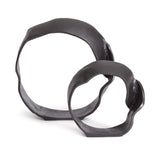 A matte black finish and rough, organic repeated circular shapes make these cast aluminum sculptures unique. A  contemporary touch for home office or den on book shelf, mantle or console. Amethyst Home provides interior design, new construction, custom furniture, and area rugs in the Park City metro area.