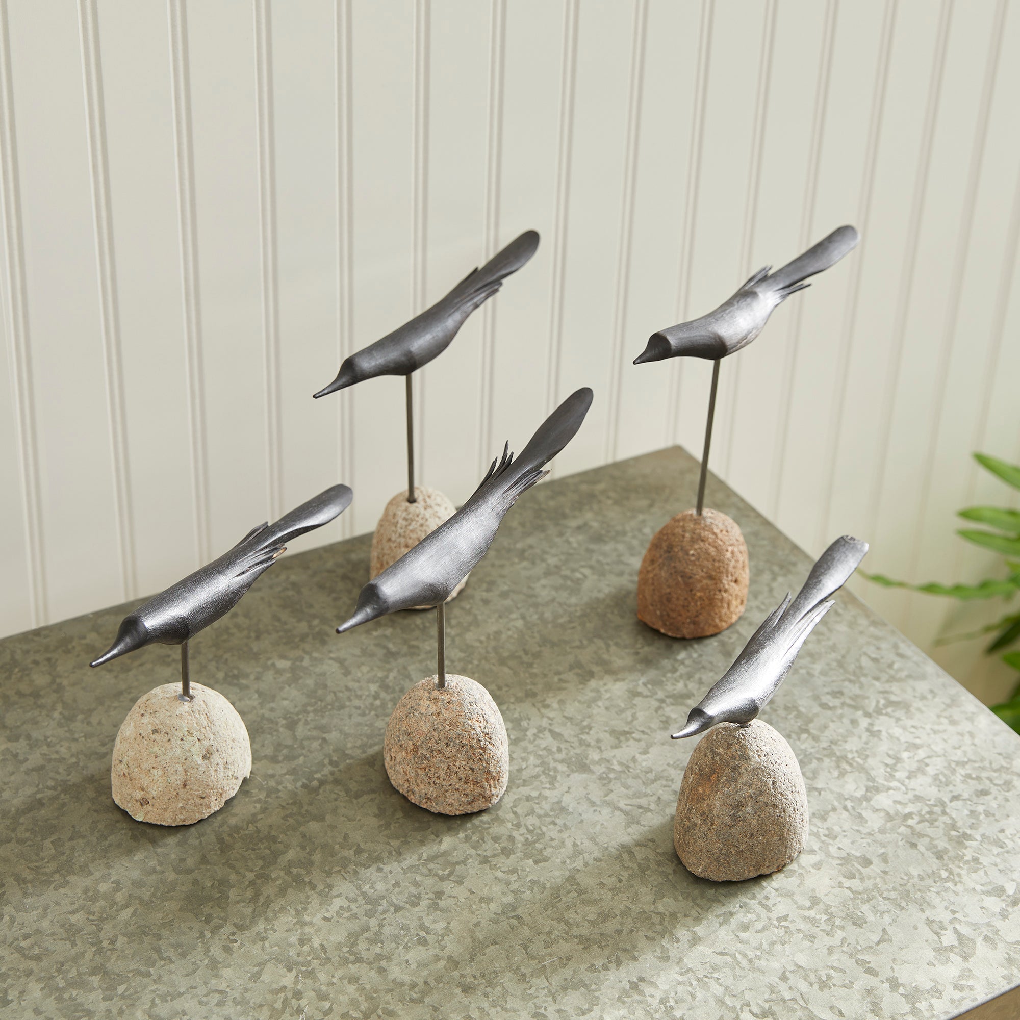 Handcrafted rustic artwork with modern black birds. Amethyst Home provides interior design, new construction, custom furniture, and area rugs in the Monterey metro area.
