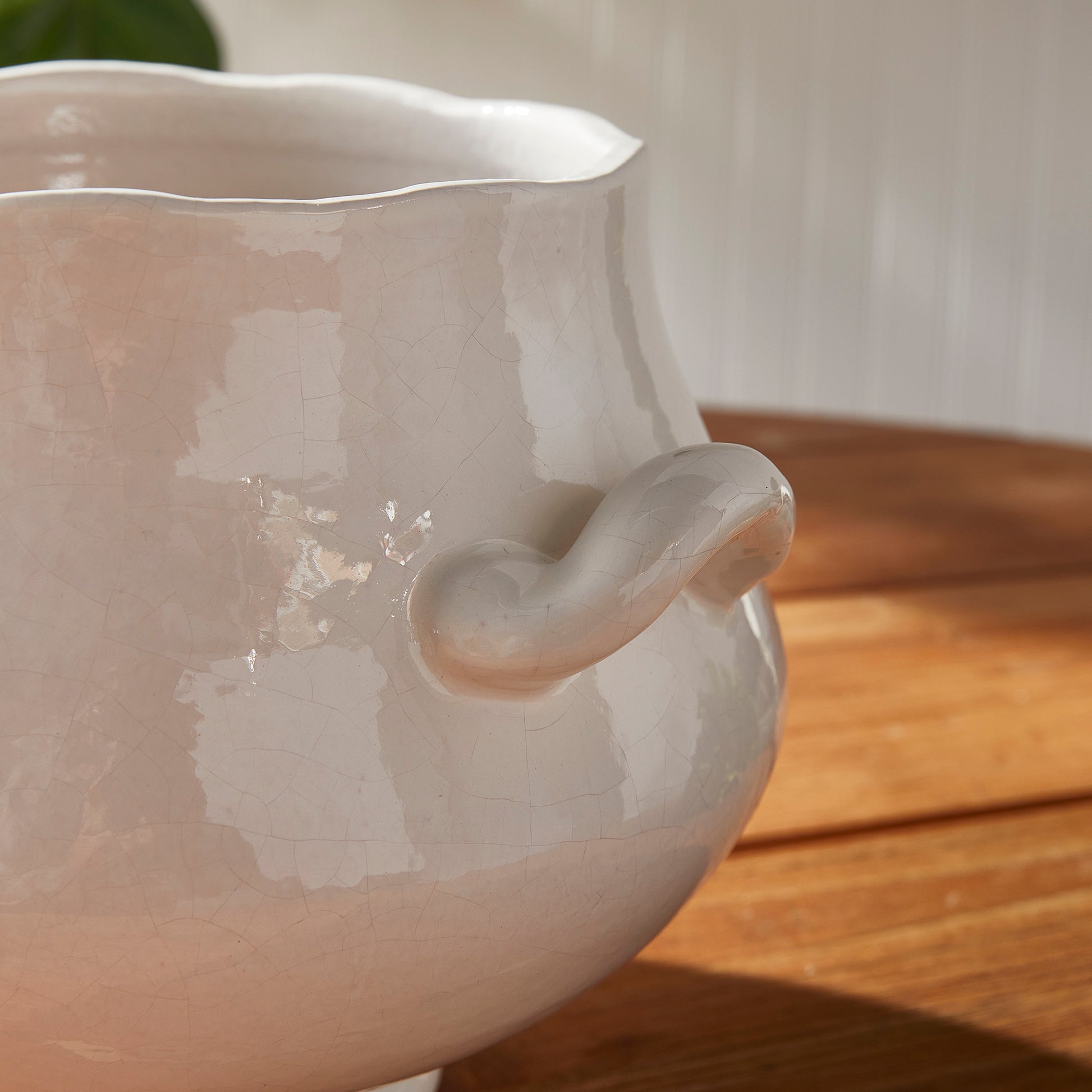 At first glance, the Wellon Cachepot looks like your average vessel, but the organic rim and curvy shape make it an instant classic. Pair with one of our hand-crafted drop-ins and the result is perfection. Amethyst Home provides interior design, new construction, custom furniture, and area rugs in the Laguna Beach metro area.