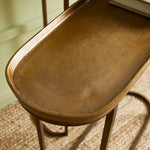 Nested console… what a concept! In an electroplated cast aluminum top and  iron legs, these two pieces fit together nicely, or can be separated to accommodate your layout. Innovative and beautiful, indeed. Amethyst Home provides interior design, new construction, custom furniture, and area rugs in the Houston metro area.