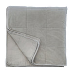 Stone washed for a soft hand feel, the Amsterdam Coverlet is a cotton velvet with a cotton backing. It features a quilted square pattern for a simple and modern look.  100% Cotton with poly fill batting. Amethyst Home provides interior design, new construction, custom furniture, and area rugs in the Kansas City metro area.