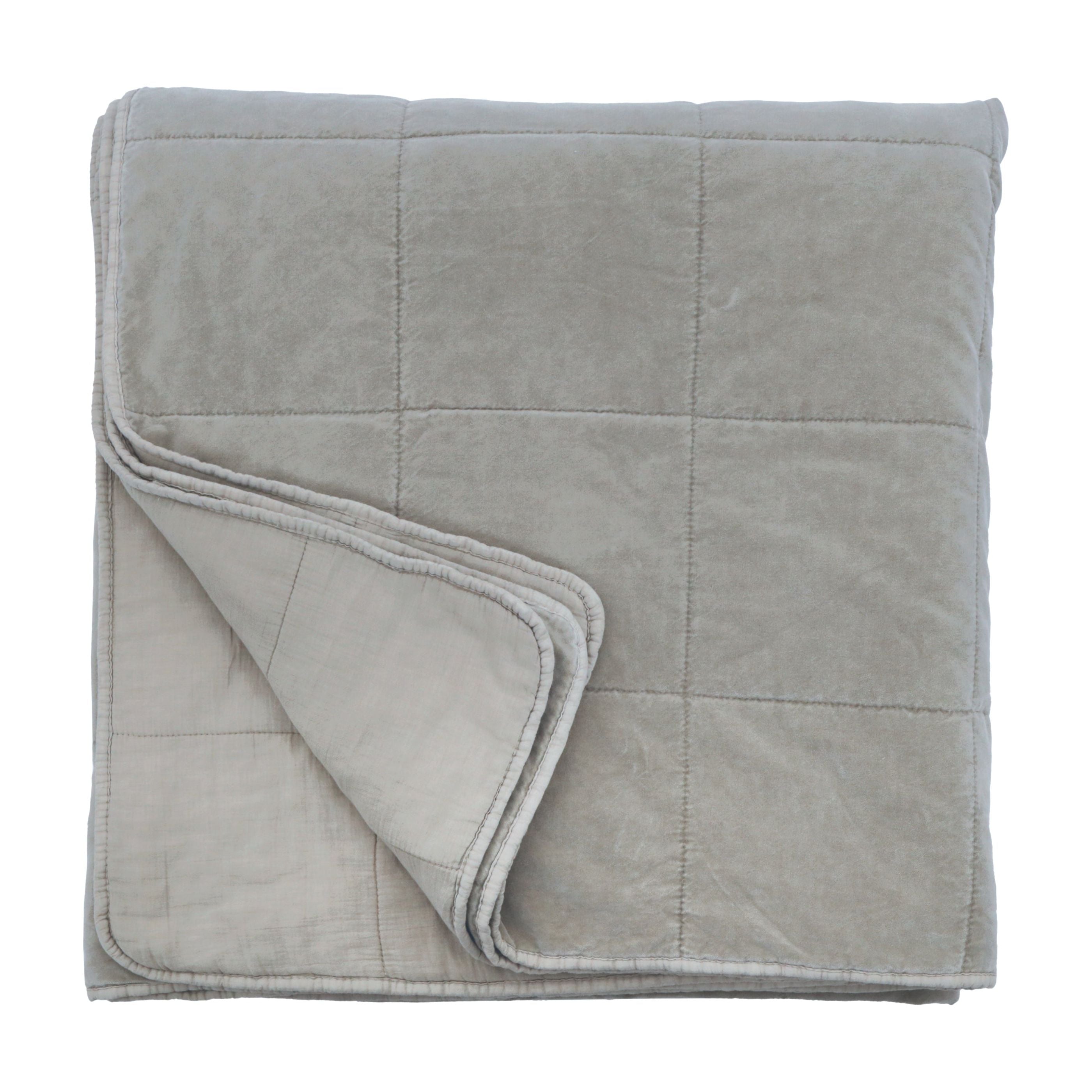 Stone washed for a soft hand feel, the Amsterdam Coverlet is a cotton velvet with a cotton backing. It features a quilted square pattern for a simple and modern look.  100% Cotton with poly fill batting. Amethyst Home provides interior design, new construction, custom furniture, and area rugs in the Kansas City metro area.