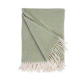 Cozy combed cotton Billie Sage Throw with a soft ivory interwoven weave ending in tassels.  Amethyst Home provides interior design services, furniture, rugs, and lighting in the Seattle metro area.
