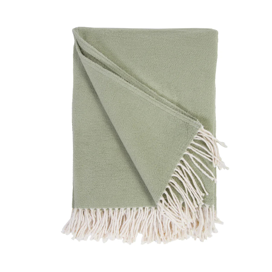 Cozy combed cotton Billie Sage Throw with a soft ivory interwoven weave ending in tassels.  Amethyst Home provides interior design services, furniture, rugs, and lighting in the Seattle metro area.