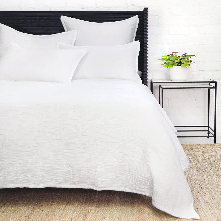 The Harbour White Matelasse Collection features an abstract, geometric weave making it a modern matelasse. The matelasse achieves a beautiful texture without any batting. Amethyst Home provides interior design services, furniture, rugs, and lighting in the Kansas City metro area.