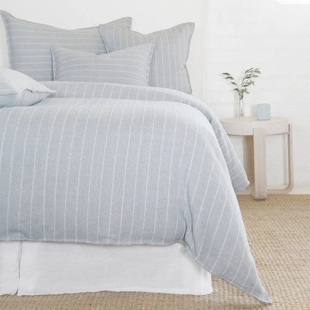 Soft and relaxed, the Henley is heavyweight cotton with a finely hand loomed texture and a thin interwoven stripe pattern. It creates a clean and casual look for your bedroom.  Made of 100% heavyweight cotton, featuring shell-button closures. Amethyst Home provides interior design, new home construction design consulting, vintage area rugs, and lighting in the Seattle metro area.
