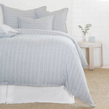 Soft and relaxed, the Henley is heavyweight cotton with a finely hand loomed texture and a thin interwoven stripe pattern. It creates a clean and casual look for your bedroom.  Made of 100% heavyweight cotton, featuring shell-button closures. Amethyst Home provides interior design, new home construction design consulting, vintage area rugs, and lighting in the Seattle metro area.