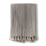 This hand loomed blanket gives beautiful, natural linen texture while staying soft and comfy. Lovely tassels along the top and bottom edges.   Available in 7 colors.   This hand loomed blanket gives beautiful, natural linen texture while staying soft and comfy. Lovely tassels along the top and bottom edges.   Available in 7 colors Amethyst Home provides interior design, new home construction design consulting, vintage area rugs, and lighting in the Charlotte metro area.