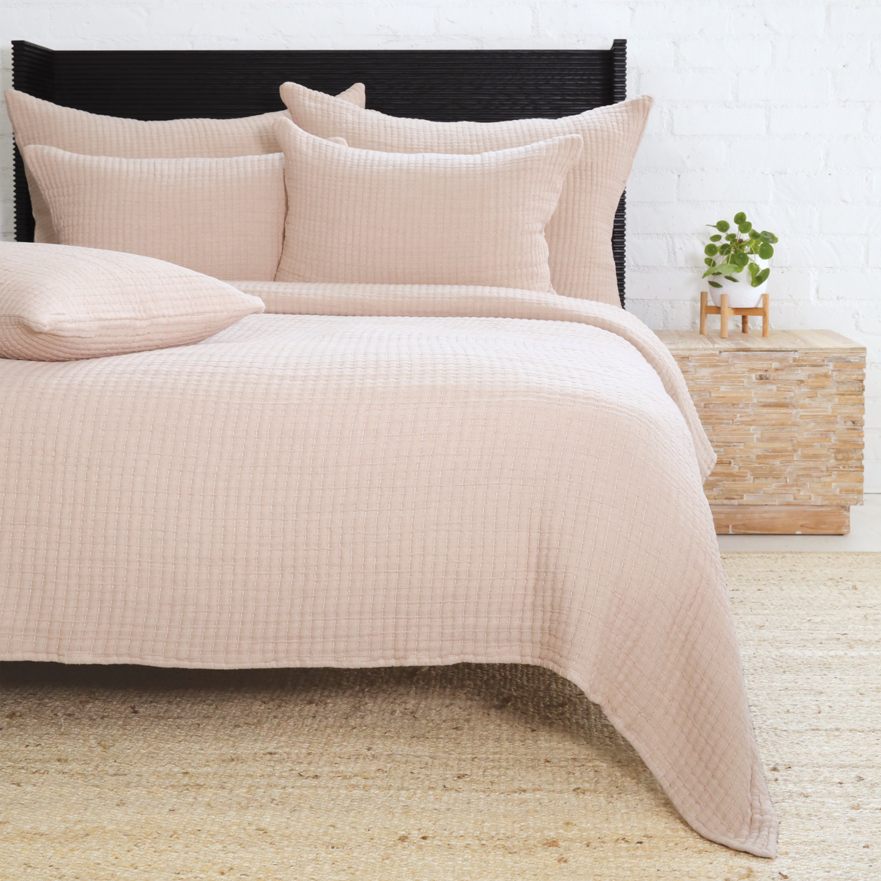 Add textural interest to your bed with the Vancouver Coverlet collection. Made of a lightweight stonewashed cotton gauze with an interwoven ivory stripe, it is the perfect addition to your bed to create a relaxing space. Amethyst Home provides interior design, new construction, custom furniture, and area rugs in the Nashville metro area.