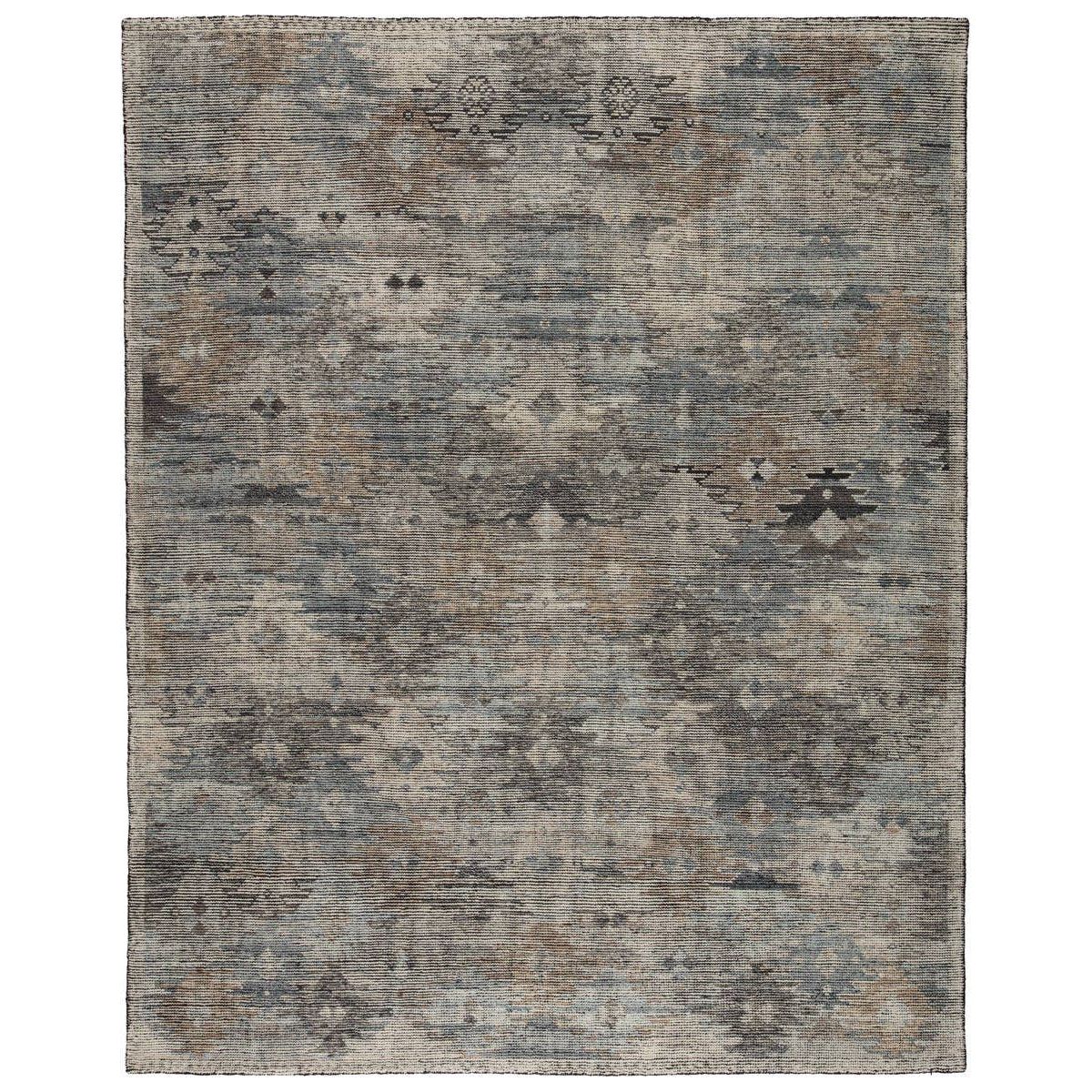 The Jaipur Living Rize Nakoda Area Rug, or RIZ 08, has a dynamic tribal motif that creates an all-over design on the artistically distressed Nakoda area rug. In a black, tan, white, and blue colorway, this durable hand-knotted wool rug is a gorgeous choice for any living room, bedroom, or other high traffic area. 