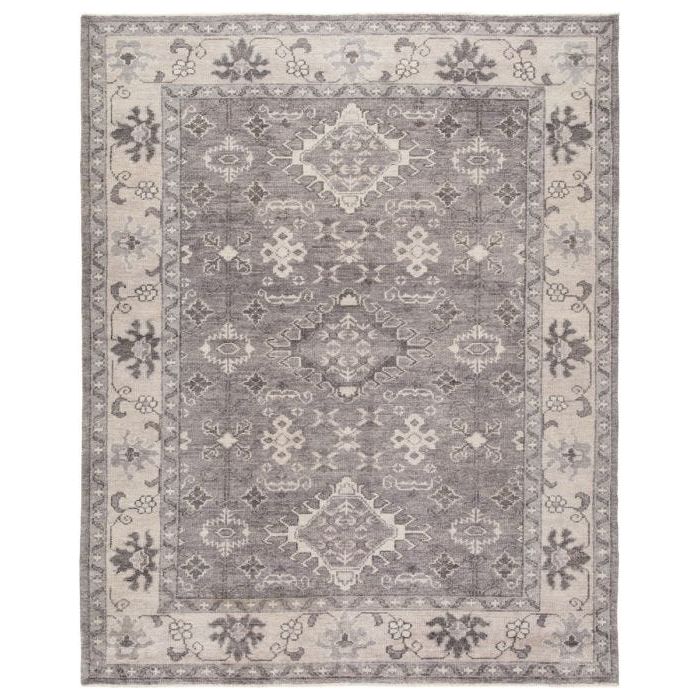 The Salinas collection is punctuated by traditional, intricate details and a soft, hand-knotted wool construction. The neutral Kella area rug makes a transitional statement with grounding hues and tribal motifs. This durable, artisan-made rug features a floral border and medallion accents in a tonal gray colorway.  Hand-Knotted 100% Wool SLN12 Salinas Kella