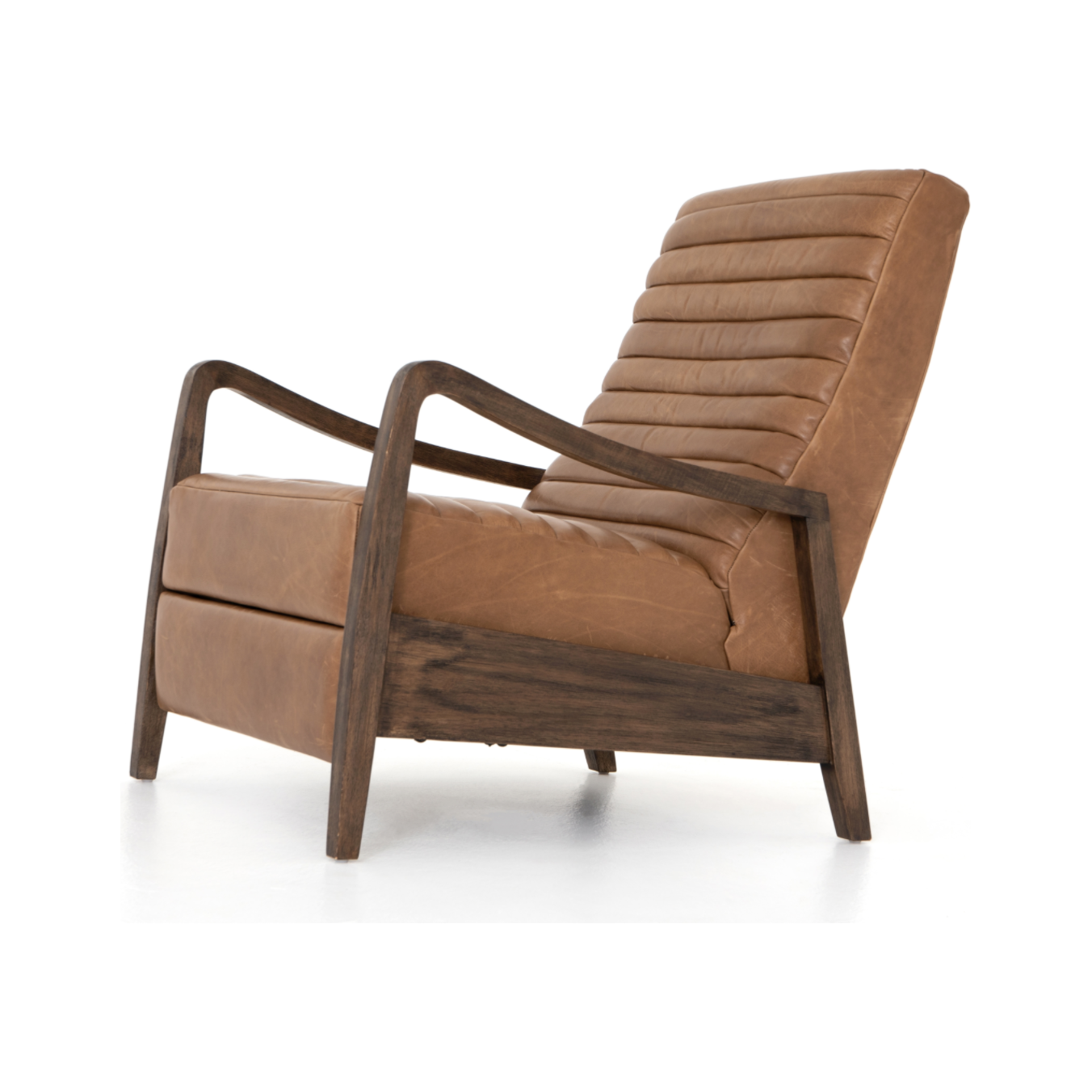 The Chance Recliner has an invitingly curved seat with dramatic horizontal channels is covered in soft, camel-colored top-grain leather. Rich, tonal frame captures alluring negative—and positive—spaces. A push recliner takes this forward-thinking lounger to the next level.  Overall Dimensions: 27.50"w x 56.00"d x 36.00"h Seat Depth: 20.25" Seat Height: 18" Arm Height from Floor: 24" Arm Height from Seat: 6"