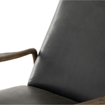 The craftsmanship of the sophisticated Braden Recliner seen here in Dakota Black is second to none. With its soft leather and silhouette, this recliner will look great in your main living space or office. Amethyst Home provides interior design, new home construction design consulting, vintage area rugs, and lighting in the Laguna Beach metro area.