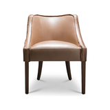 A Verellen best-seller, the Melvin Dining Chair features a tight back, tight seat, and double needle stitch detail. Custom leg finishes are available.   Upholstered and slipcovered available Double needle stitch Seat Details: Tight seat configuration, Foam down seat construction Back Details: Tight back configuration Leg Details: Exposed leg available, Custom finish