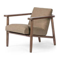 Featuring Arnett Chair by Four Hands at Amethyst Home. Textural cream boucle seating offers a sumptuous sit, with complementary wire-brushed parawood framing forming a slim U shape. Two posterior top-grain leather straps add a stylish finishing touch. Performance fabrics are specially created to withstand spills, stains, high traffic and wear, ensuring lon. Amethyst Home provides interior design, new home construction design consulting, vintage area rugs, and lighting in the Scottsdale metro area.