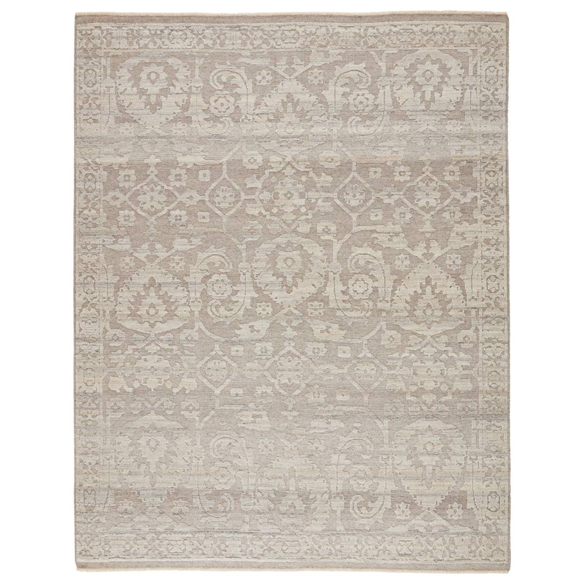 The Sonnette Ayres Area Rug by Jaipur Living, or SNN03, boasts a neutral palette of light taupe and gray that creates beautiful dimension among the brocade design. This hand-knotted wool rug features fringe trimmed details for a touch of global charm. A gorgeous choice for your bedroom or other medium traffic areas. 