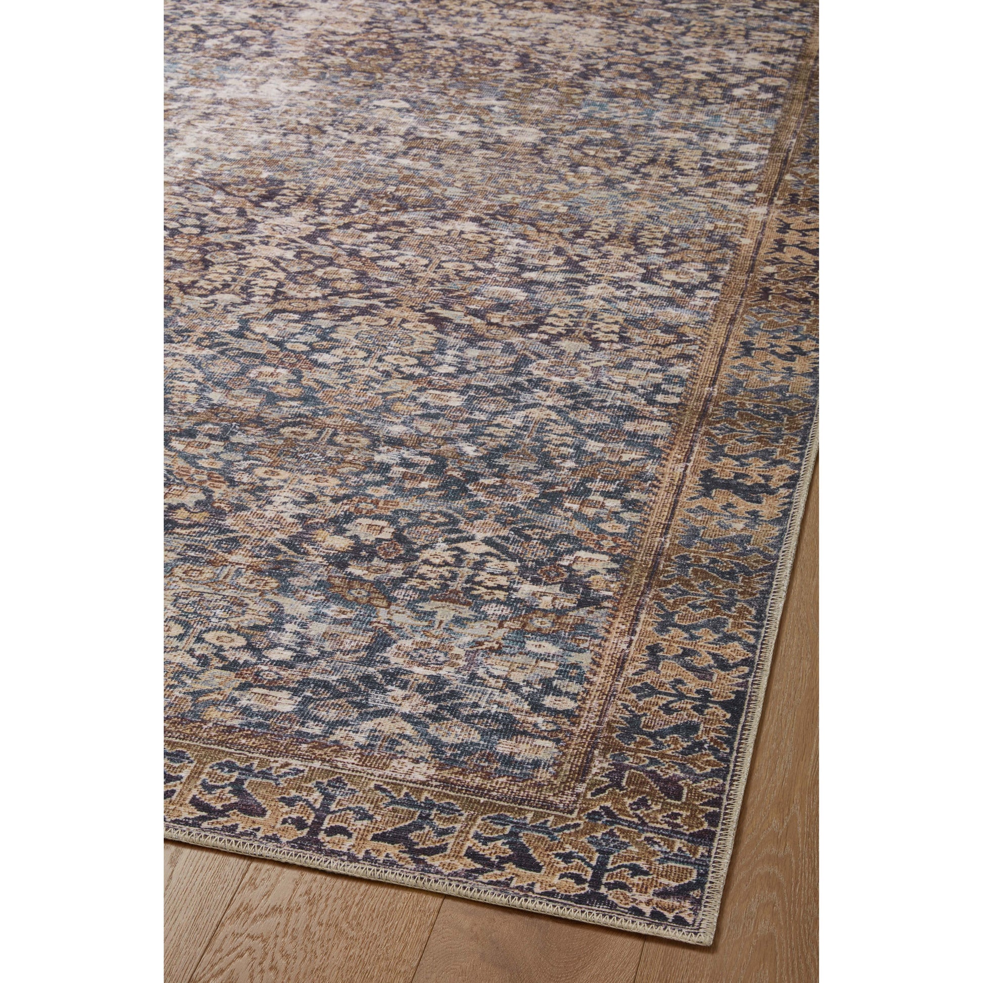 Inspired by interior designer Amber Lewis' penchant for vintage rugs, the Georgie Collection features a printed construction with incredible durability, color saturation, and no shedding. The rug's low, flat pile is designed for easy vacuuming and feels smooth underfoot. Georgie also carries the Oeko-TexÂ® label, ensuring the rug's materials do not contain harmful substances. Amethyst Home provides interior design, new construction, custom furniture, and area rugs in the Kansas City metro area.