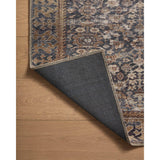 Featuring Amber Lewis x Loloi Georgie Denim / Spice Rug by Loloi at Amethyst Home. Inspired by interior designer Amber Lewis' penchant for vintage rugs, the Georgie Denim / Spice rug features a printed construction with incredible durability, color saturation, and no shedding. The rug's low, flat pile is designed for easy vacuuming and feels smooth underfoot. Georgie also car. Amethyst Home provides interior design, new construction, custom furniture, and area rugs in the Newport Beach metro area.