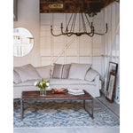 Add unique and modern lighting to a room with this Spider Chandelier from Cisco Brothers. The curved arms add beautiful sight lines to the fixture and plenty of light. This light fixture sets any room apart and comes available in either a "rust" or "flat black" finish in three different sizes.