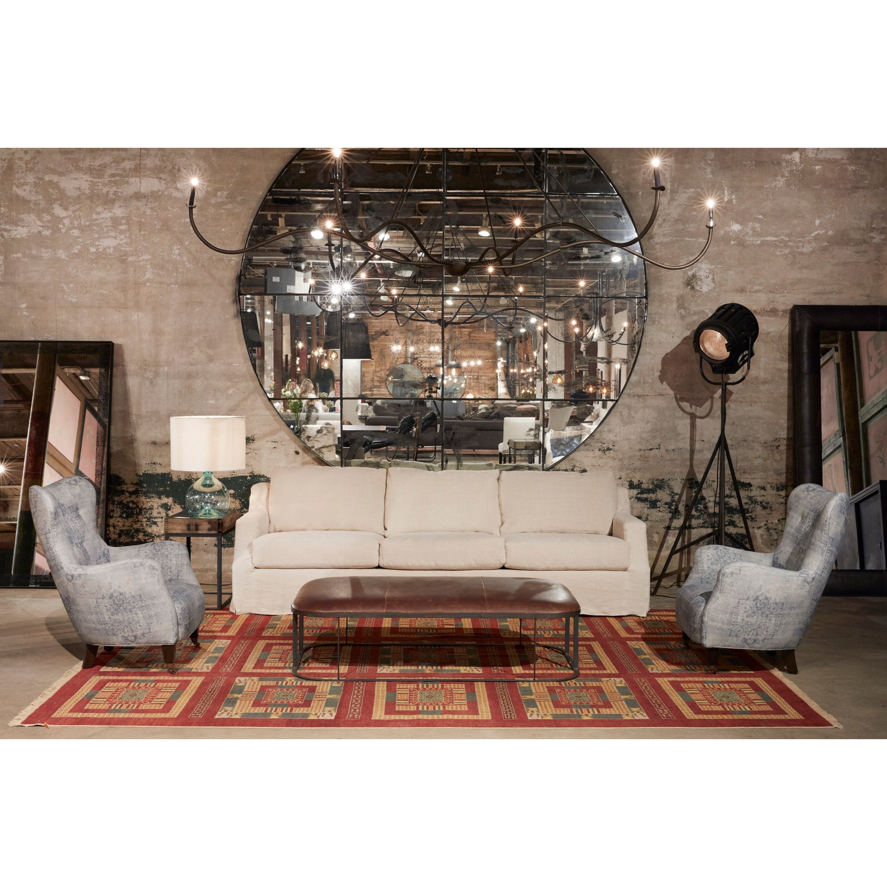 Add unique and modern lighting to a room with this Spider Chandelier from Cisco Brothers. The curved arms add beautiful sight lines to the fixture and plenty of light. This light fixture sets any room apart and comes available in either a "rust" or "flat black" finish in three different sizes.