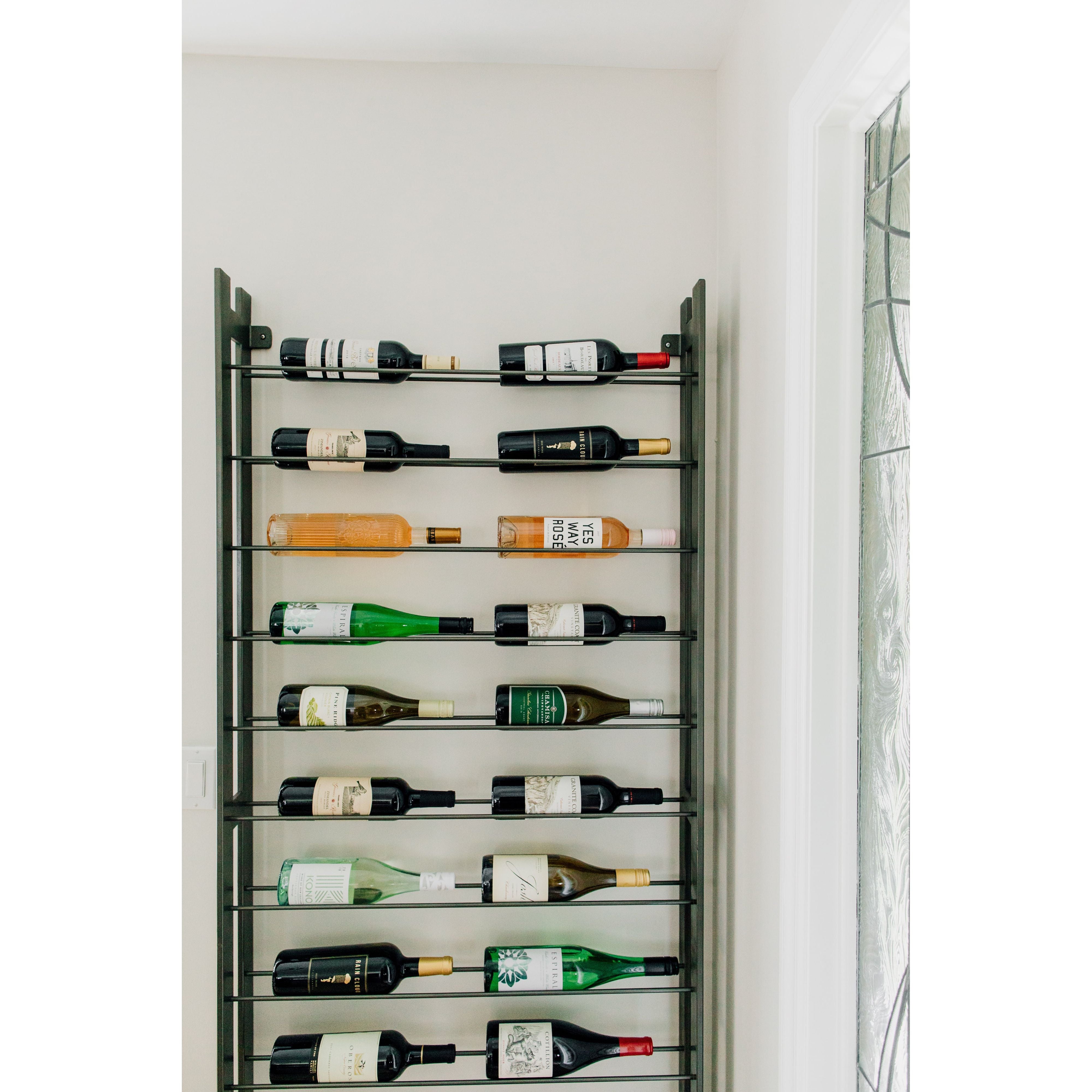 Featuring Wine Rack by Four Hands at Amethyst Home. Store – and sip – in style. Tall, wall-mountable iron wine rack is finished in gunmetal, with open shelving for proper storage and stylish display of favorite wines. Anchors included.
Overall Dimensions: 32"W x 5.75"L x 72"H
Colors: GunmetalMaterials: IronWeight: 37.48 lbVolume: 13.07 cu ft. Amethyst Home provides interior design, new home construction design consulting, vintage area rugs, and lighting in the Kansas City metro area.