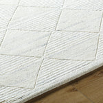 Featuring Becki Owens x Surya Gina White Hand-Knotted Rug by Surya at Amethyst Home. This Becki Owens x Surya Gina White Hand-Knotted Rug adds joyful elegance to any space. The intricate knotting and hand-crafted details make it a stunning centerpiece for your home. It will brighten up any room while providing a classic look that will last for years to com. Amethyst Home provides interior design, new home construction design consulting, vintage area rugs, and lighting in the Alpharetta metro area.