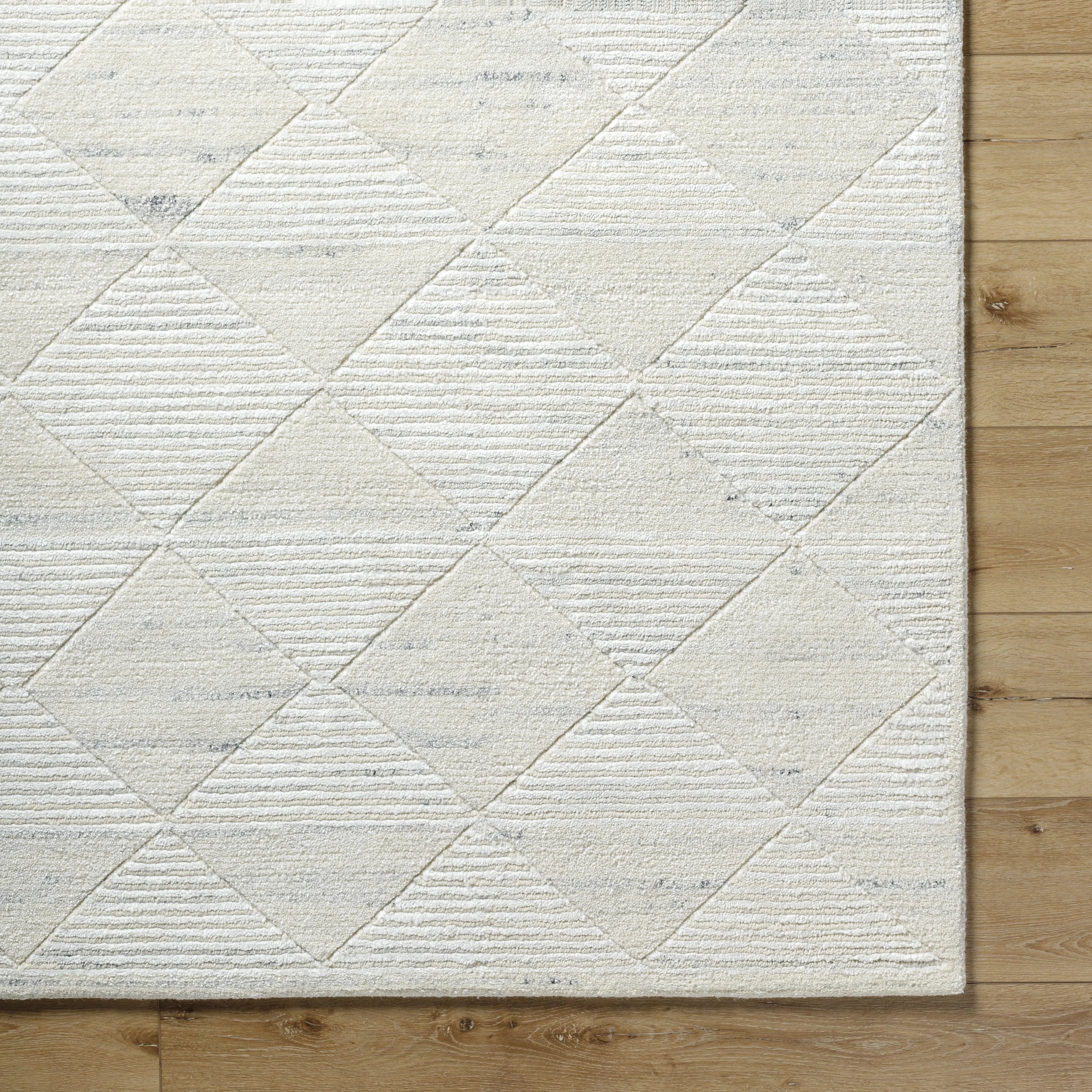 Featuring Becki Owens x Surya Gina White Hand-Knotted Rug by Surya at Amethyst Home. This Becki Owens x Surya Gina White Hand-Knotted Rug adds joyful elegance to any space. The intricate knotting and hand-crafted details make it a stunning centerpiece for your home. It will brighten up any room while providing a classic look that will last for years to come.. Amethyst Home provides interior design, new home construction design consulting, vintage area rugs, and lighting in the Portland metro area.