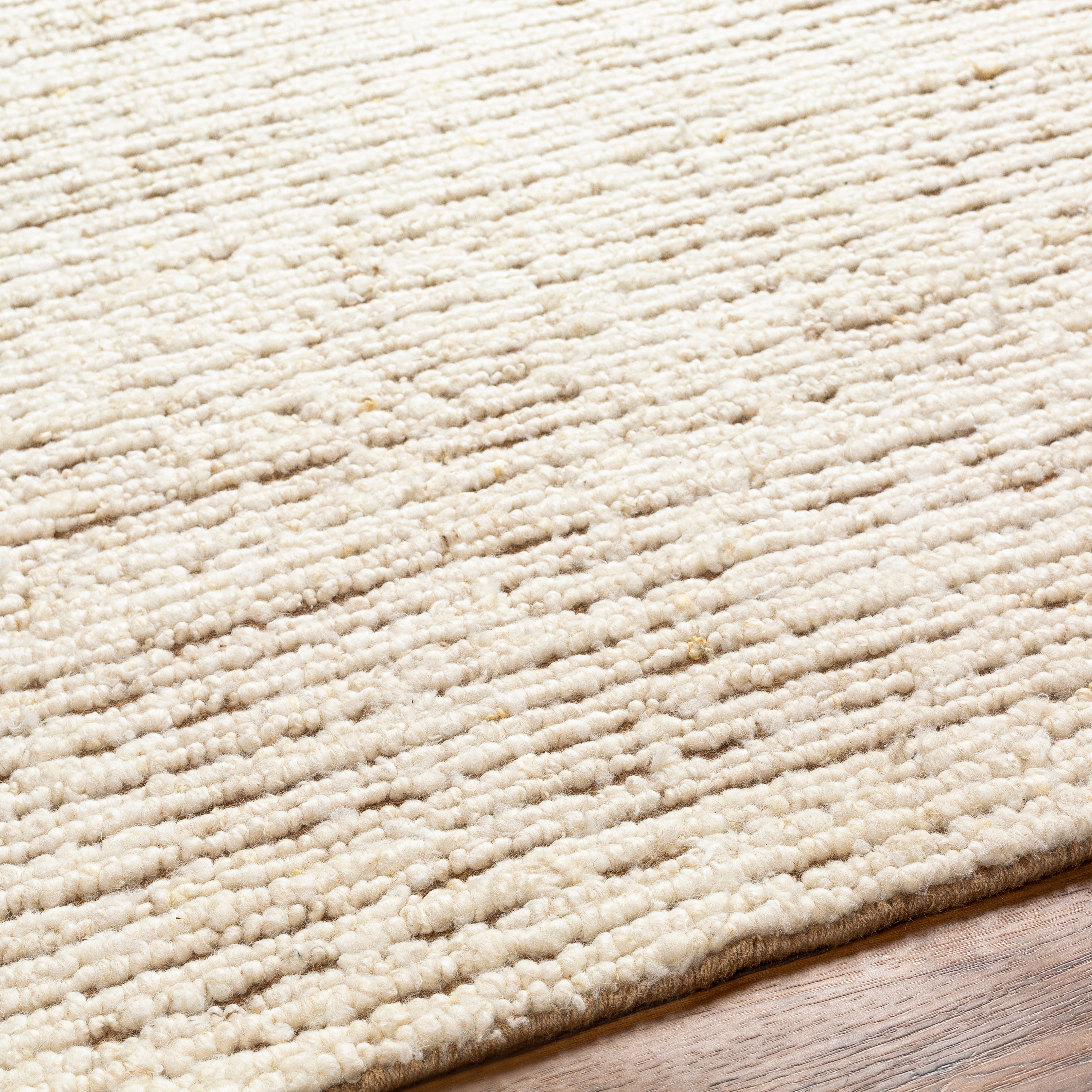 The simplistic yet compelling Brentford rug effortlessly serve as the exemplar representation of modern decor. The meticulously woven construction of these pieces boasts durability and will provide natural charm into your decor space. Made with Wool, Jute, and has Medium Pile. Spot Clean Only, One Year Limited Warranty. Amethyst Home provides interior design, new construction, custom furniture, and area rugs in the Alpharetta metro area