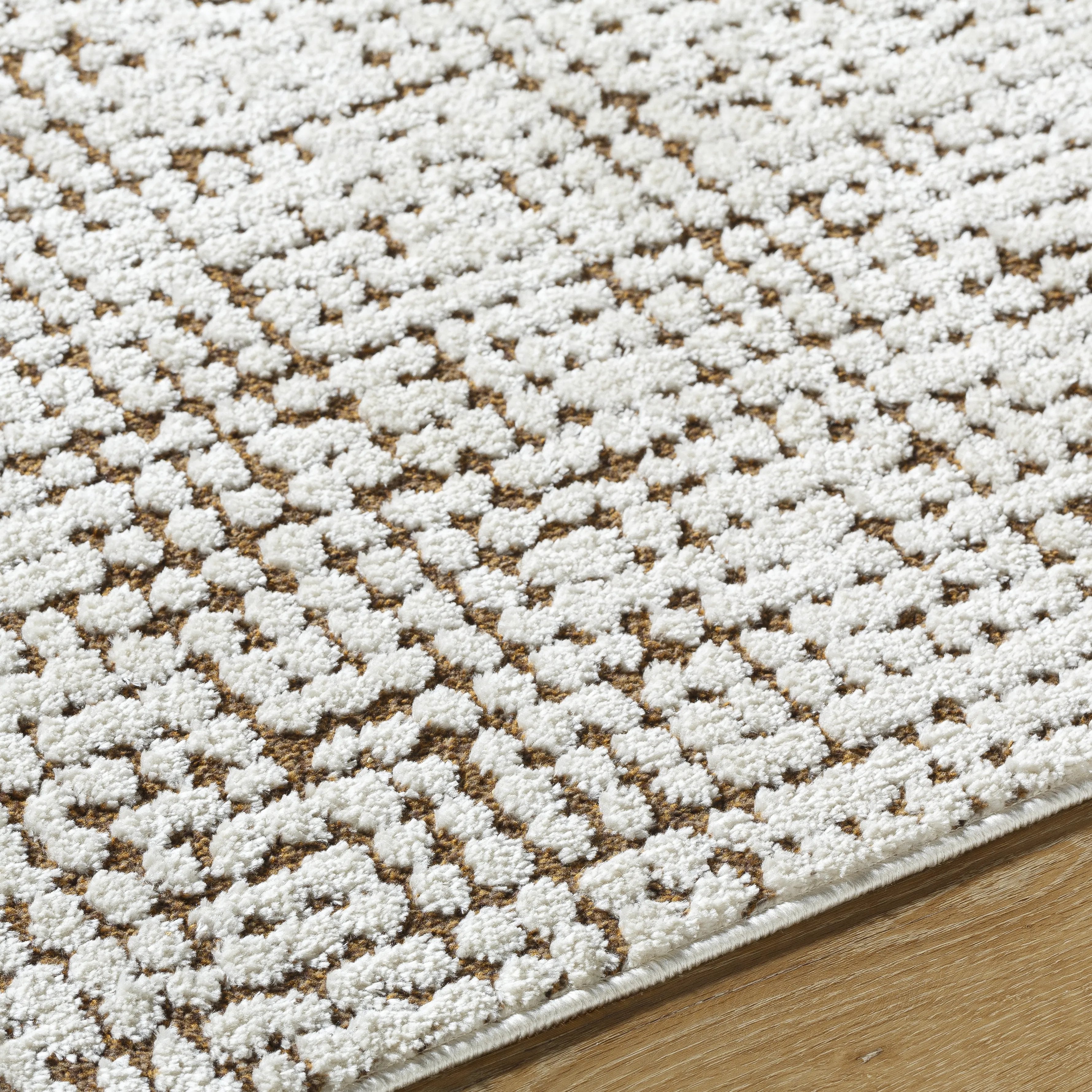 Featuring Cascade Ivory Rug by Surya at Amethyst Home. The Cascade Ivory Rug is expertly crafted with 100% wool, providing a durable and soft foundation for any room. Its neutral ivory color brings a sense of calm and elegance to your space. Made with quality and style in mind, this rug is the perfect addition to your home.
100% PolyesterMachine Woven High Pi.  Amethyst Home provides interior design, new home construction design consulting, vintage area rugs, and lighting in the Austin metro area.