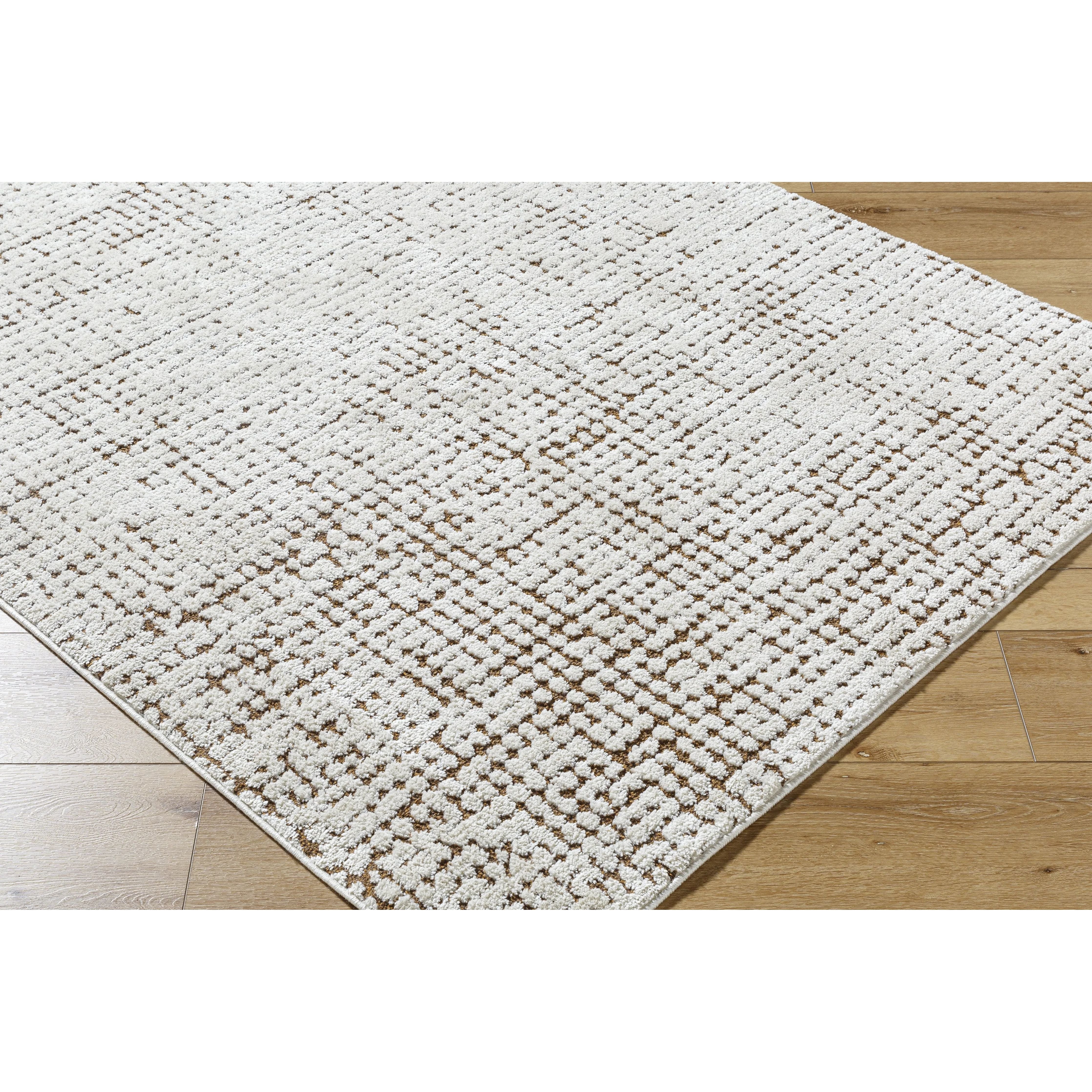 Featuring Cascade Ivory Rug by Surya at Amethyst Home. The Cascade Ivory Rug is expertly crafted with 100% wool, providing a durable and soft foundation for any room. Its neutral ivory color brings a sense of calm and elegance to your space. Made with quality and style in mind, this rug is the perfect addition to your home.
100% PolyesterMachine Woven High P.  Amethyst Home provides interior design, new home construction design consulting, vintage area rugs, and lighting in the Houston metro area.