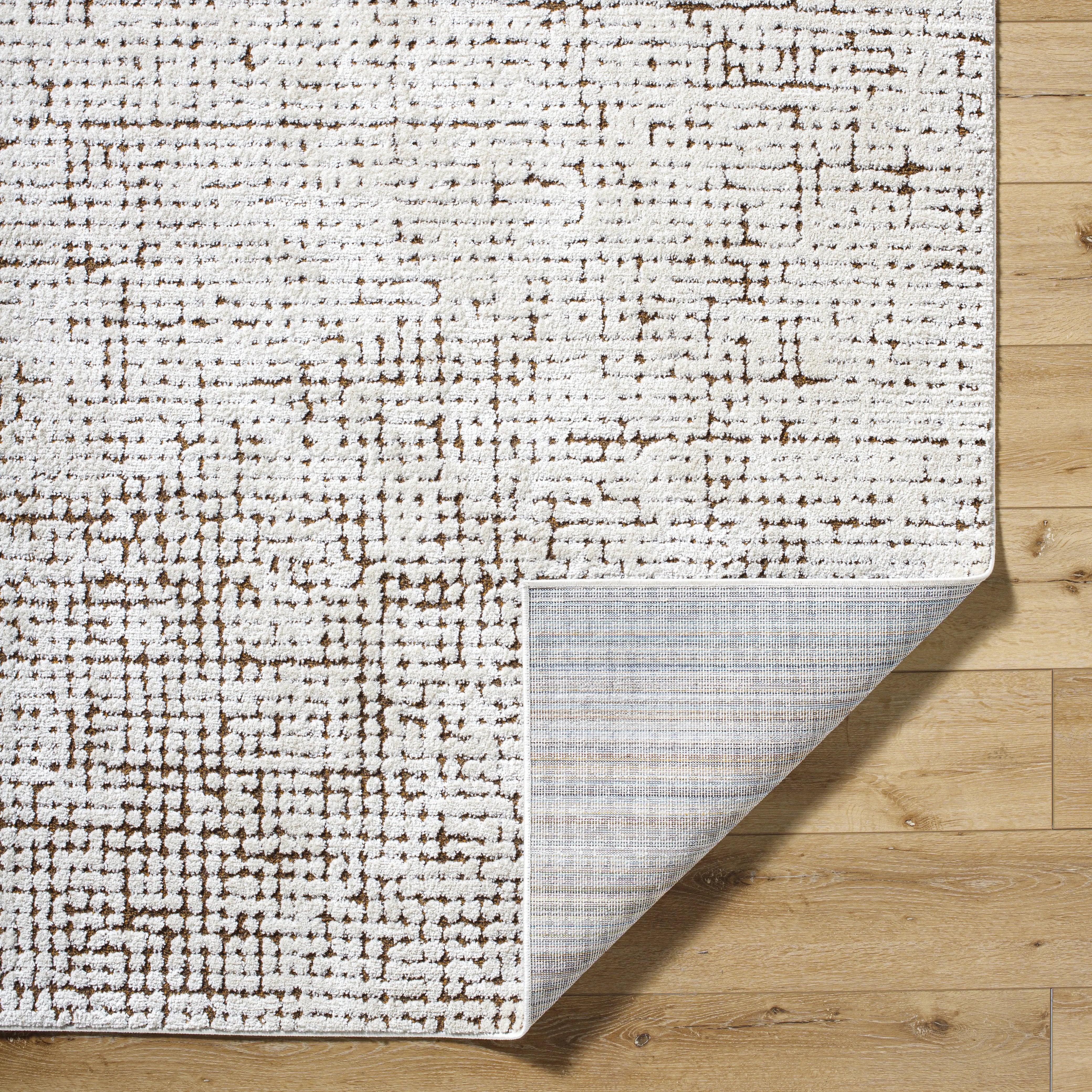 Featuring Cascade Ivory Rug by Surya at Amethyst Home. The Cascade Ivory Rug is expertly crafted with 100% wool, providing a durable and soft foundation for any room. Its neutral ivory color brings a sense of calm and elegance to your space. Made with quality and style in mind, this rug is the perfect addition to your home.
100% PolyesterMachine Woven High P.  Amethyst Home provides interior design, new home construction design consulting, vintage area rugs, and lighting in the Houston metro area.