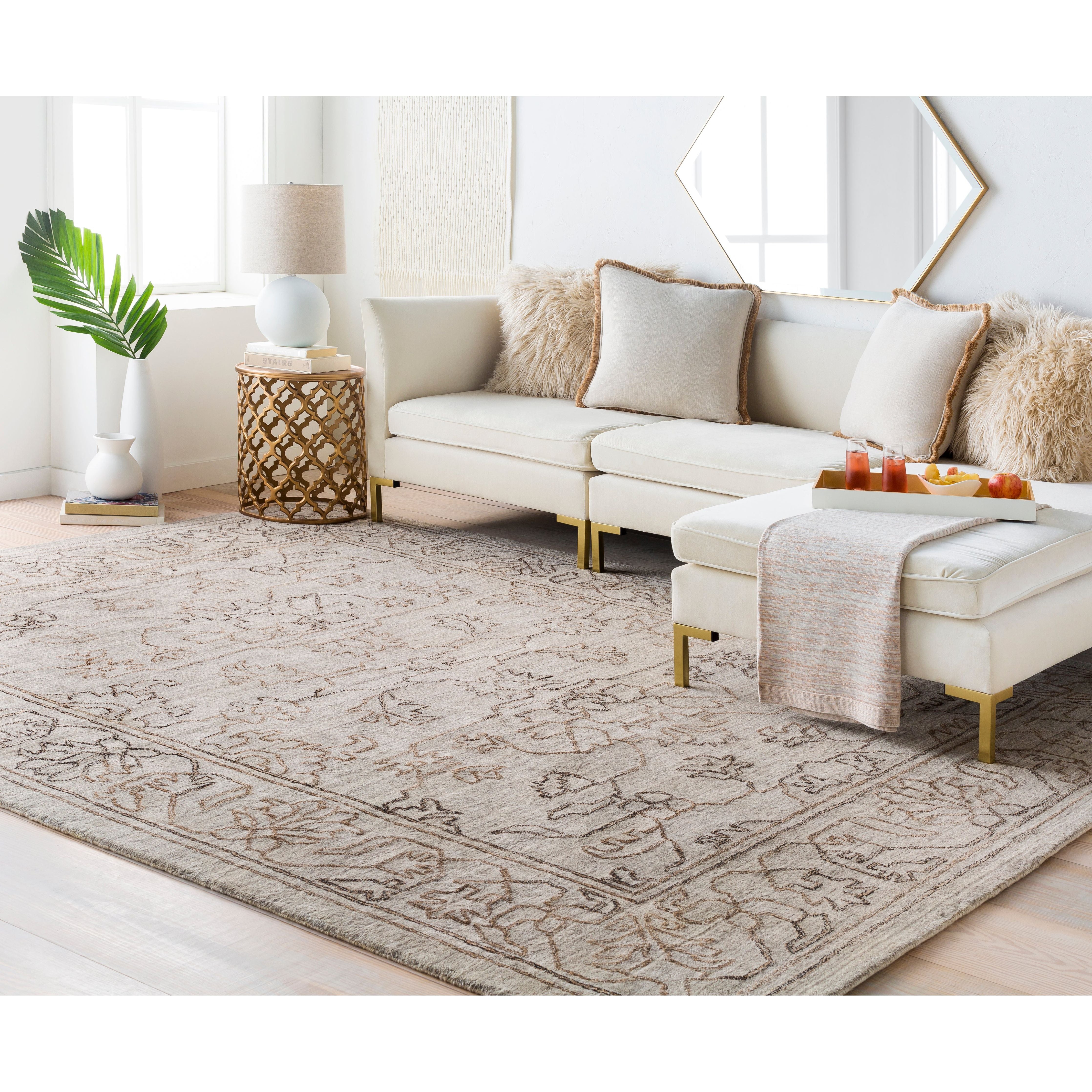 Featuring Hightower Brown Hand-Knotted Rug by Surya at Amethyst Home. The Hightower Collection showcases traditional inspired designs that exemplify timeless styles of elegance, comfort, and sophistication. With their Hand-Knotted construction, these rugs provide a durability that can not be found in other handmade constructions, and boasts the ability to be thoroughly cleaned. Amethyst Home provides interior design, new construction, custom furniture, and area rugs in the Winter Garden metro area