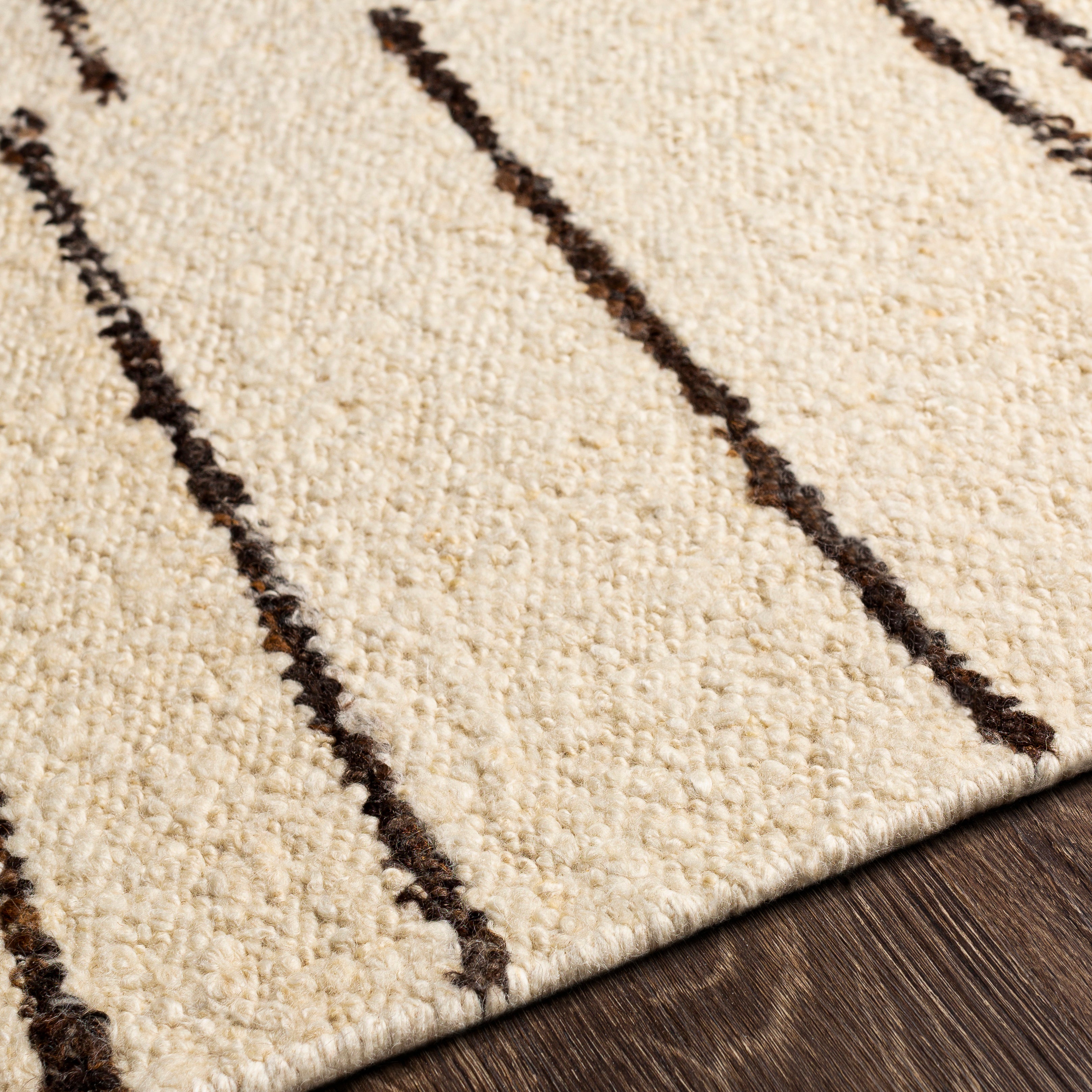 The Machu Picchu Collection features compelling global inspired designs brimming with elegance and grace! The perfect addition for any home, these pieces will add eclectic charm to any room! The meticulously woven construction of these pieces boasts durability and will provide natural charm into your decor space. Made with Wool, Polyester in India, and has No Pile. Amethyst Home provides interior design, new construction, custom furniture, and area rugs in the Charlotte metro area